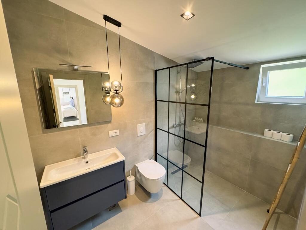 Private bathroom with walk-in shower