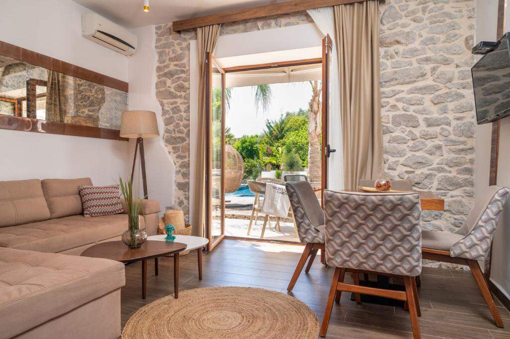 Living room with stone wall